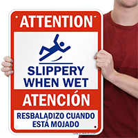 Bilingual Fall Hazard, Slippery When Wet Sign