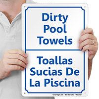 Bilingual Pool Area, Dirty Pool Towels Sign