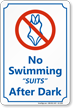 No Swimming Suits After Dark Sign